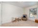 Cozy bedroom with a recliner and small table and chairs at 129 Jeffress Dr, Louisburg, NC 27549