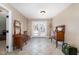 Inviting entryway with tile floors and antique furniture at 129 Jeffress Dr, Louisburg, NC 27549