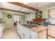Spacious kitchen with a large island, granite countertops, and sleek, modern appliances at 129 Jeffress Dr, Louisburg, NC 27549