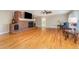 Spacious living room with hardwood floors, brick fireplace, and seating at 129 Jeffress Dr, Louisburg, NC 27549