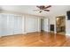Spacious main bedroom with hardwood floors, closet space, and access to the en-suite bathroom at 129 Jeffress Dr, Louisburg, NC 27549