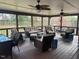 Screened porch with plenty of seating and natural light at 129 Jeffress Dr, Louisburg, NC 27549
