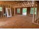 Framed interior of home under construction, featuring natural light and spacious room layout at 2850 Sheep Pasture Rd, Spring Hope, NC 27882