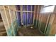 Unfinished bathroom with wood framing, plumbing, and a window at 3934 Well Fleet Drive, Fuquay Varina, NC 27526