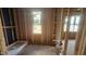 Unfinished bathroom with rough-in plumbing, window, and a white shower base at 3934 Well Fleet Drive, Fuquay Varina, NC 27526