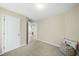 Cozy bedroom with neutral carpet, white doors, and a view to the bathroom at 418 Bergen Ave, Apex, NC 27502