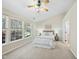 Inviting main bedroom featuring a large window and neutral decor at 418 Bergen Ave, Apex, NC 27502