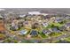 Beautiful aerial view of a neighborhood, showcasing well-manicured lawns and a serene lake nearby at 4236 Aviemore, Burlington, NC 27215