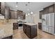 Modern kitchen with granite countertops, stainless steel appliances, and a center island at 4236 Aviemore, Burlington, NC 27215