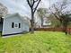Expansive backyard featuring well-kept lawn and a privacy fence perfect for outdoor enjoyment and entertaining at 1003 W Anderson St, Selma, NC 27576