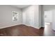 Spacious bedroom featuring wood-look floors, two closets and a connecting door at 1003 W Anderson St, Selma, NC 27576