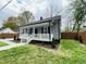 Lovely home with manicured lawn, featuring a covered porch and a well-maintained exterior at 1003 W Anderson St, Selma, NC 27576