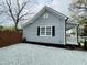 Charming home featuring newly done driveway, updated vinyl siding, and well-maintained landscaping at 1003 W Anderson St, Selma, NC 27576