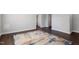 Open concept living area with a modern rug, showcasing spacious layout and smooth transitions to other rooms at 1003 W Anderson St, Selma, NC 27576