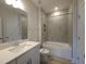 Full bathroom featuring a single sink vanity, bathtub, and wooden-style tile flooring at 200 Ironwood Lot 39 Blvd, Youngsville, NC 27596