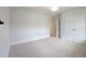 Spacious bedroom with neutral carpeting, double closet and access to other rooms at 200 Ironwood Lot 39 Blvd, Youngsville, NC 27596