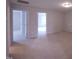 Spacious bedroom featuring neutral walls and floors, connecting to other rooms at 200 Ironwood Lot 39 Blvd, Youngsville, NC 27596