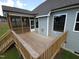 Wooden deck offering a view of the screened porch and backyard space at 200 Ironwood Lot 39 Blvd, Youngsville, NC 27596
