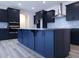Spacious kitchen with stainless steel appliances, granite countertops and center island at 200 Ironwood Lot 39 Blvd, Youngsville, NC 27596