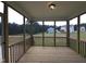 Relaxing screened porch with wooded views and new wood floor at 200 Ironwood Lot 39 Blvd, Youngsville, NC 27596