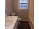 Bathroom with white vanity, toilet, and bathtub at 2800 Coleman Loop Rd, Hillsborough, NC 27278