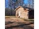 Brick home featuring a front door entrance and an outdoor dirt area at 2800 Coleman Loop Rd, Hillsborough, NC 27278
