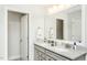 Bathroom with double vanity, granite countertop, and a shower at 418 Providence Springs Ln, Fuquay Varina, NC 27526
