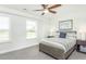Bedroom with a full-size bed and ceiling fan at 418 Providence Springs Ln, Fuquay Varina, NC 27526