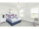 Bedroom with a queen-size bed and chandelier at 418 Providence Springs Ln, Fuquay Varina, NC 27526