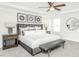 Spacious main bedroom with plush bed and elegant decor at 418 Providence Springs Ln, Fuquay Varina, NC 27526
