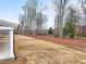 Large backyard with a border of mature trees at 906 Brookfield Dr, Gibsonville, NC 27249