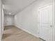 Bright bedroom with white walls and a light wood floor at 906 Brookfield Dr, Gibsonville, NC 27249