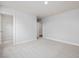 Bright bedroom with neutral carpet, walls, and a closet at 906 Brookfield Dr, Gibsonville, NC 27249