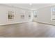 Large room with recessed lighting, wood floors and multiple windows at 906 Brookfield Dr, Gibsonville, NC 27249