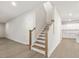 Staircase with wood treads and white risers leading to the upper level of the home at 906 Brookfield Dr, Gibsonville, NC 27249