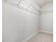 The walk-in closet features wire shelving for optimal organization and storage at 906 Brookfield Dr, Gibsonville, NC 27249