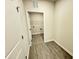 Conveniently located laundry room with washer and dryer hookups and shelving at 166 Vega Loop, Sanford, NC 27330