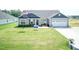 Charming single-Gathering home with manicured lawn and a two-car garage at 596 Ravensworth Dr, Garner, NC 27529