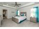 Spacious main bedroom with a ceiling fan, recessed lighting, and light gray wood furnishings at 596 Ravensworth Dr, Garner, NC 27529