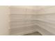 Walk-in pantry with wire shelving all around, providing ample storage space at 596 Ravensworth Dr, Garner, NC 27529