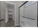 Walk-in shower with a glass door, and tile flooring at 125 Leisure Ln, Louisburg, NC 27549