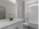 Bathroom features a bright vanity, contemporary fixtures, and a shower-tub combo at 125 Leisure Ln, Louisburg, NC 27549
