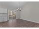 Dining room with hardwood floors, sliding glass doors leading to a covered porch at 125 Leisure Ln, Louisburg, NC 27549