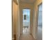 Hallway view leading to a bathroom with a new vanity at 130 S Estes Dr # G5, Chapel Hill, NC 27514