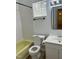 Traditional bathroom featuring a tub, toilet, vanity and an abundance of natural light through a window at 130 S Estes Dr # G5, Chapel Hill, NC 27514
