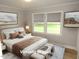Cozy bedroom with soft lighting, plush bedding and neutral tones at 2253 Nc Highway 96 S, Franklinton, NC 27525