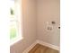 Laundry room features luxury vinyl plank flooring and neutral paint at 2253 Nc Highway 96 S, Franklinton, NC 27525