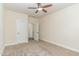Comfortable bedroom with a ceiling fan, carpet, and standard trim at 226 Begen St, Morrisville, NC 27560