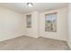 Cozy bedroom featuring plush carpeting and natural light streaming through the windows at 226 Begen St, Morrisville, NC 27560