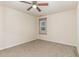 Comfortable bedroom with a ceiling fan, neutral walls, and carpeted floors at 226 Begen St, Morrisville, NC 27560